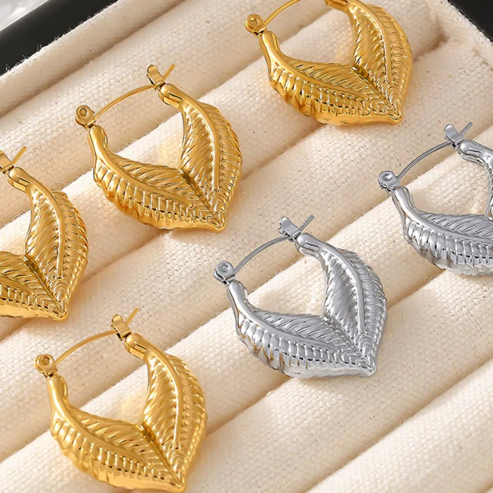 Leaf patchwork heart-shaped earrings with a niche design and titanium steel earrings