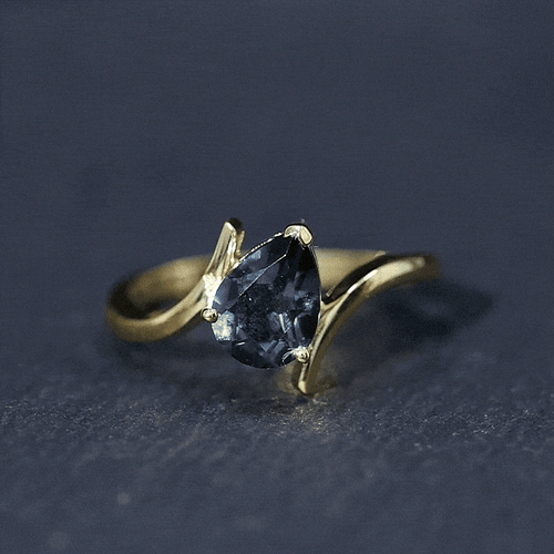 1 Carat Pear Shape London Blue Topaz Solitaire Ring with Bypass Shank