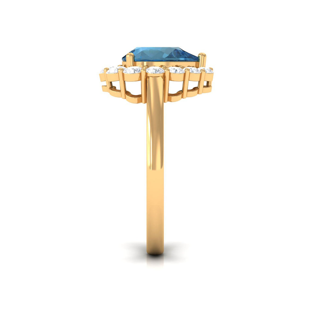 7x10mm Pear Shape London Blue Topaz Halo Engagement Ring with Diamond