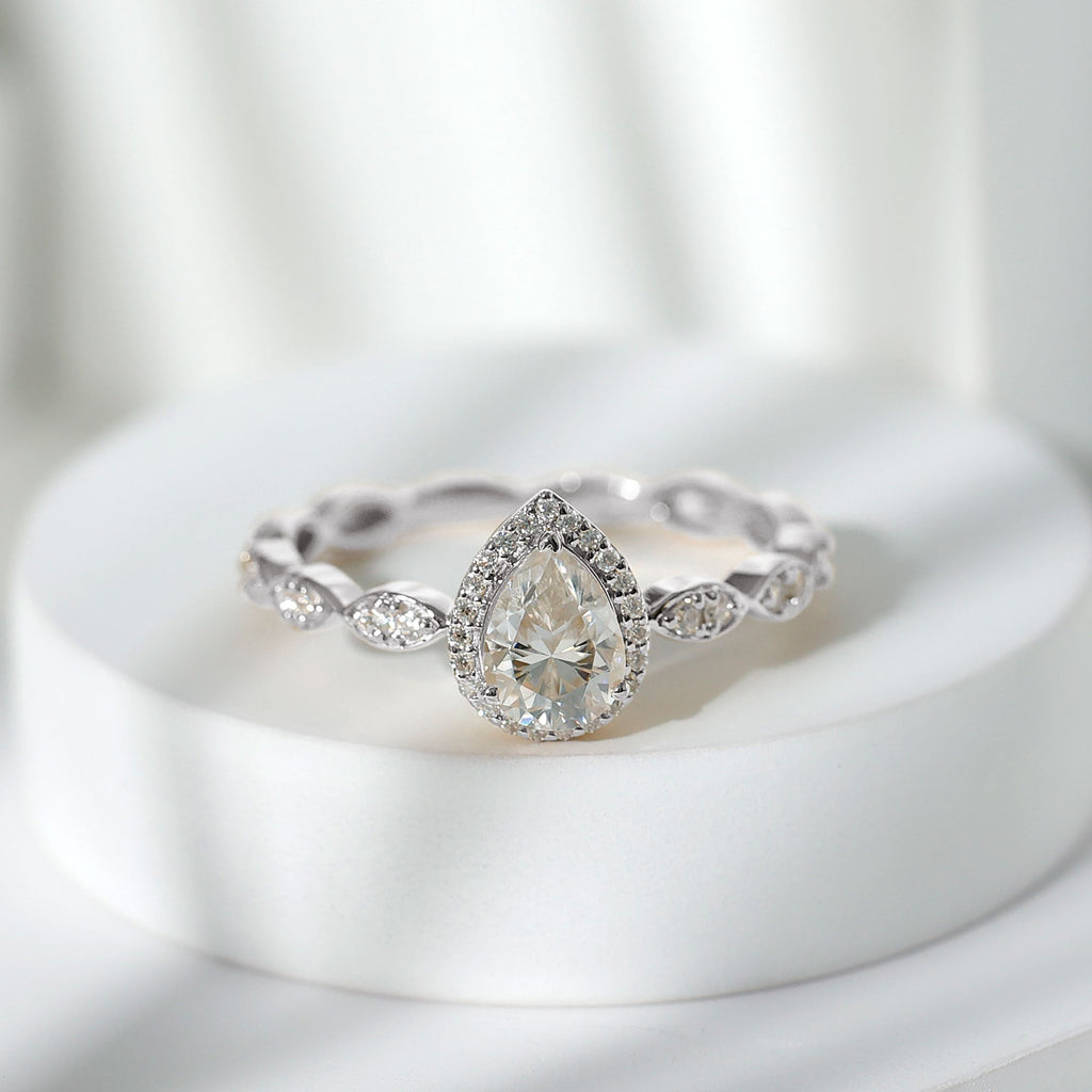 Cubic Zirconia Pear Halo Engagement Ring with Side Stones