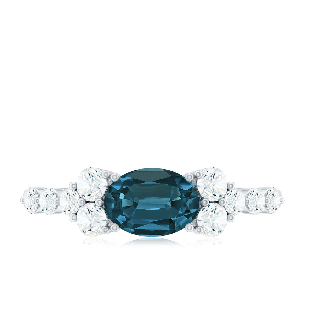 6X8mm Oval Cut London Blue Topaz Promise Ring with Diamond