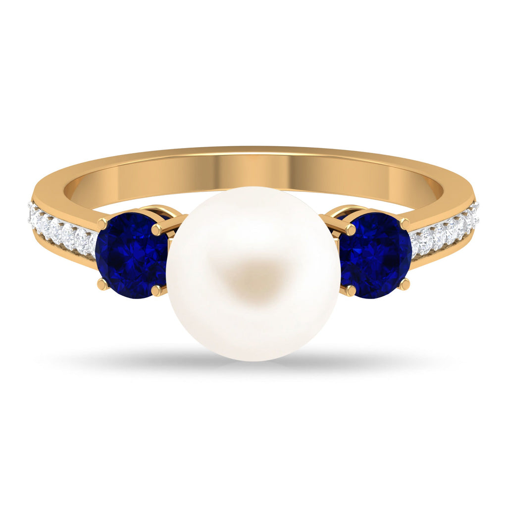 White Pearl and Sapphire 3 Stone Engagement Ring with Diamond