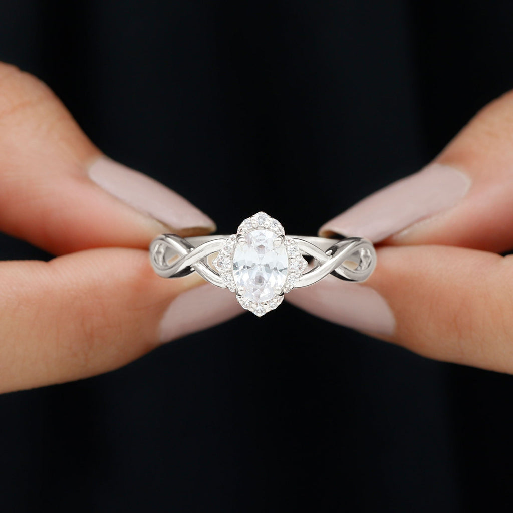 1.2 Carat Oval Cubic Zirconia Flower Engagement Ring in Crossover Shank