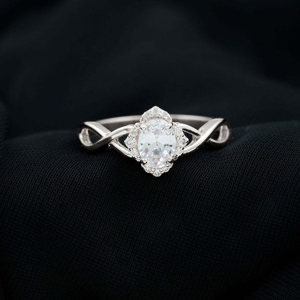 1.2 Carat Oval Cubic Zirconia Flower Engagement Ring in Crossover Shank
