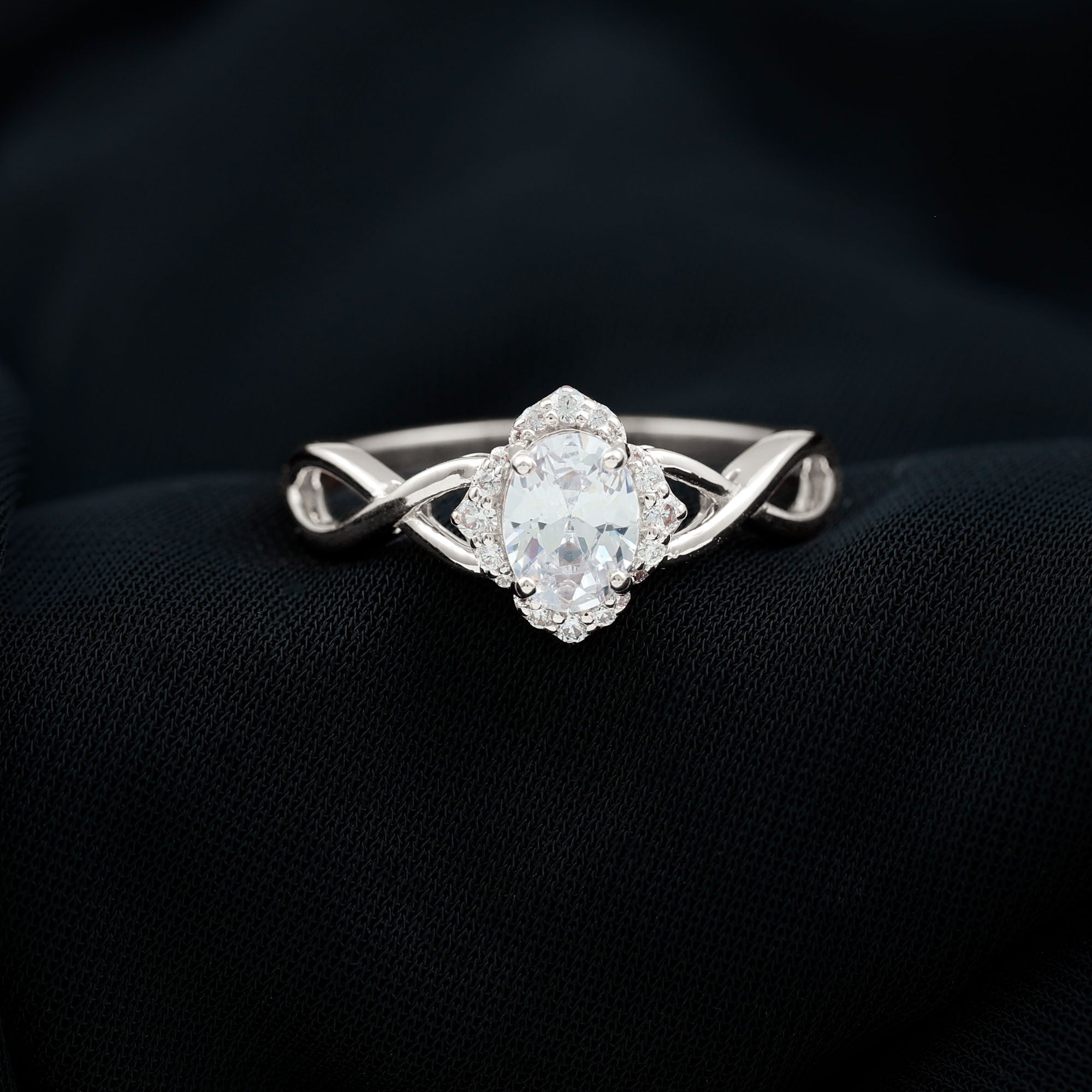 1.2 Carat Oval Cubic Zirconia Flower Engagement Ring in Crossover Shank