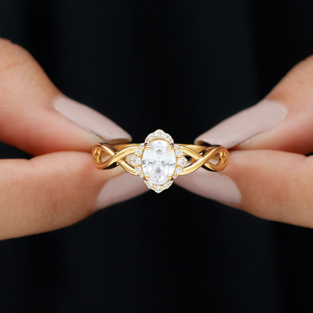 1.2 Carat Oval Cubic Zirconia Flower Engagement Ring in Crossover Shank
