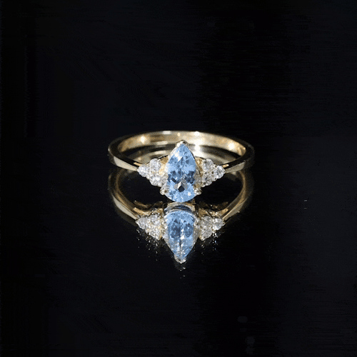 1 Carat Aquamarine Pear Engagement Ring with Diamond Trio