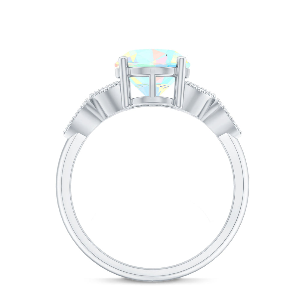 1.3 Carat Vintage Style Ethiopian Opal Oblong Engagement Ring with Diamond