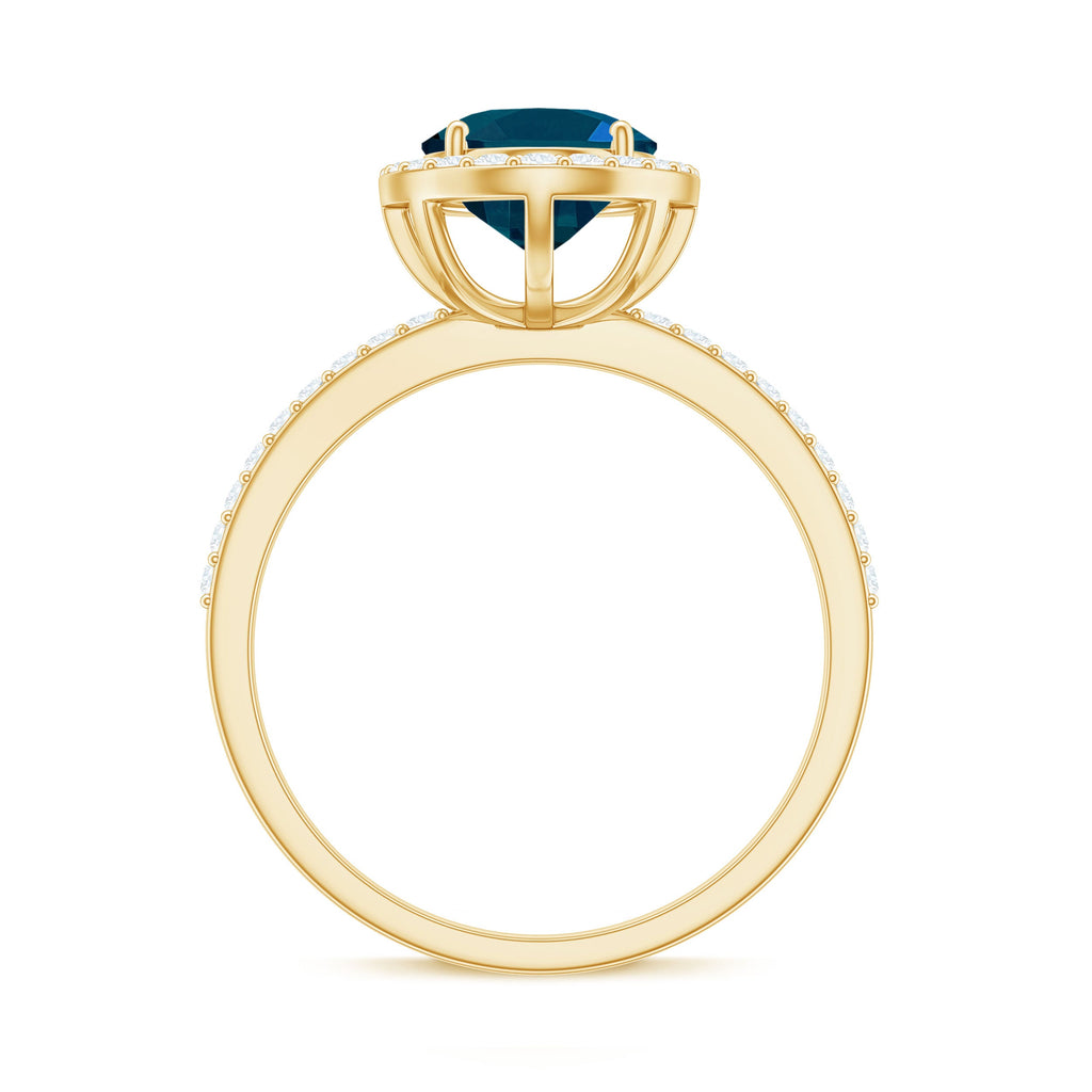 Classic London Blue Topaz Oval Engagement Ring with Diamond Halo