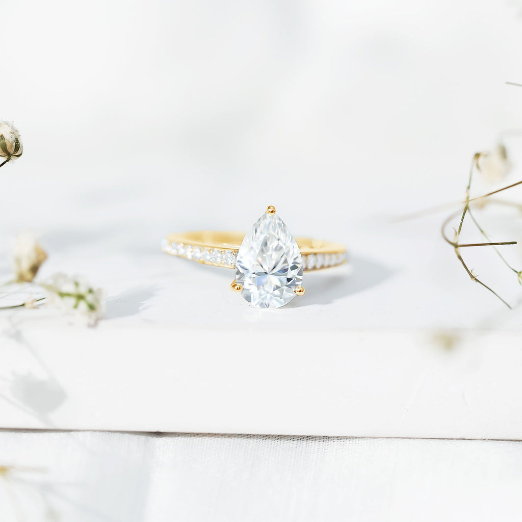 Classic Pear Cut Moissanite Solitaire Engagement Ring With Side Stones