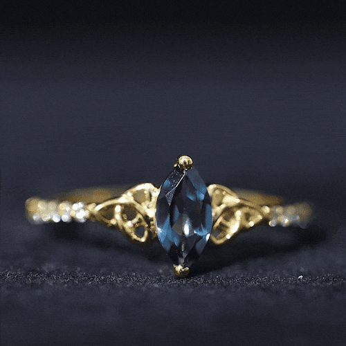 0.74 Carat Marquise Cut London Blue Topaz Celtic Engagement Ring with Diamond